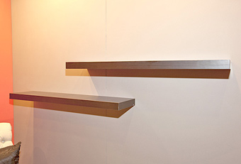 trade show booth shelving by Manny Stone Decorators