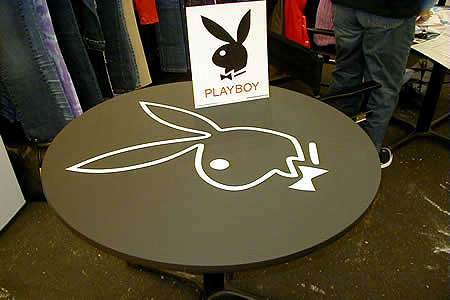 Playboy trade show booth and logo tables by Manny Stone Decorators